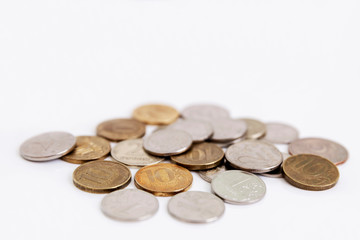 A small heap of differently colored ruble coins. Isolated on a white background.