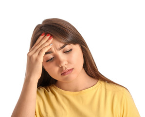 Portrait of stressed young woman on white background