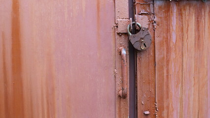 padlock on closed metal doors