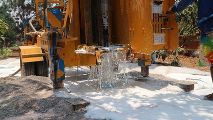Fototapeta na wymiar The machine is drilling artesian wells