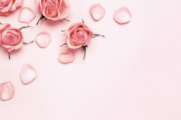 Blooming monochrome pattern. Beautiful roses and petals on pink background, copy space