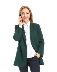 Portrait of stylish businesswoman talking by phone on white background