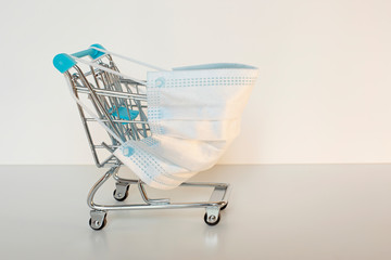 Shopping cart wearing a surgical mask