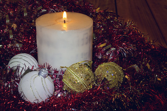 Studio photo of Christmas decoration with sheet music and glitter balls