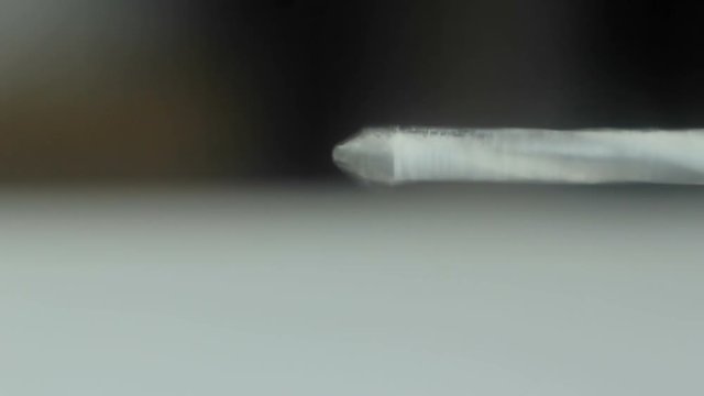 The rotation of the drill bit for drilling concrete