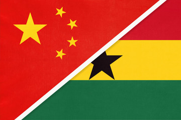 China or PRC vs Ghana national flag from textile. Relationship between Asian and African countries.