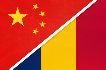 China or PRC vs Chad national flag from textile. Relationship between Asian and African countries.