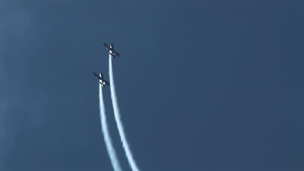 Planes doing aerial aerobatics in air show UK