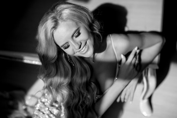 beautiful blonde bride in the morning in the room