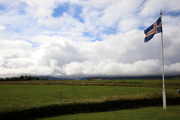Fototapeta premium Akureyri / Iceland - August 26, 2017: A Iceland flag near Laufas museum, Iceland, Europe