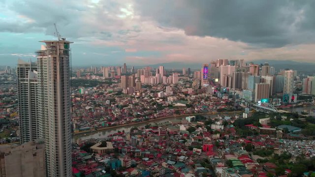 Urban city Metro Manila, Philippines. Guadalupe Nuevo, Highway. Metropolis. Slums and high rises. Aerial shot
