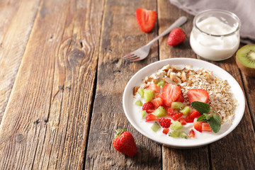 healthy breakfast with cereal, fruits and milk
