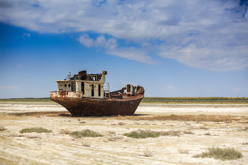 Old fishing schooner at the bottom of the dried Aral Sea