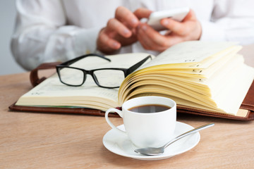 Businessman surfing internet on smartphone