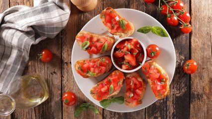 bruschettas with tomato and basil- top view