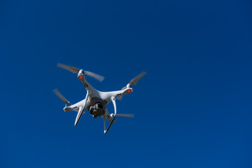 Drone remote control in hand man.Man operating of flying drone