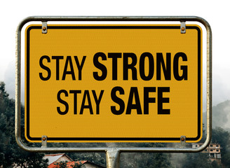 Stay Strong Stay Safe Text on Yellow Sign