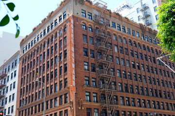 Fototapeta premium Buildings on the streets. USA, Los Angeles. July 2019. Cityscape for publications