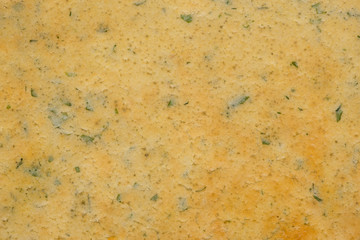 Mexican tortilla, indian naan bread with herbs, food texture background