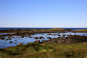 Fototapeta premium Vatnsnes / Iceland - August 27, 2017: The coast and the sea in Vatnsnes peninsula, Iceland, Europe