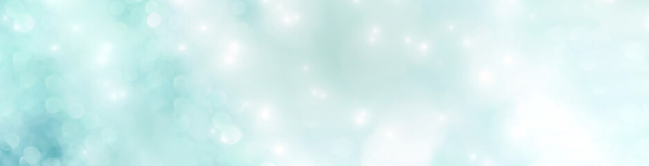 Abstract Christmas and Winter background banner - pastel background with bokeh lights

