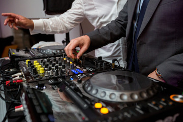 DJ playing music at mixer