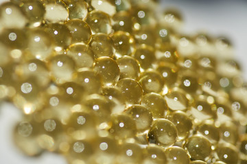 Capsules with medication, gelatin tablets with oil, vitamin or collagen.