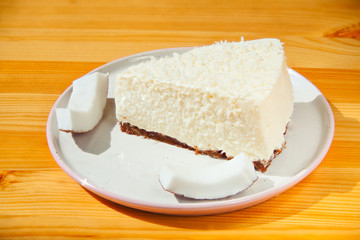 delicious cheesecake with coconut on  plate