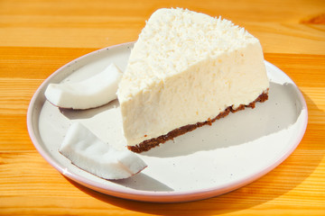 delicious cheesecake with coconut on  plate