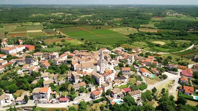 Istria. Town of Visnjan on green istrian hill aerial drone footage, Istria region of Croatia