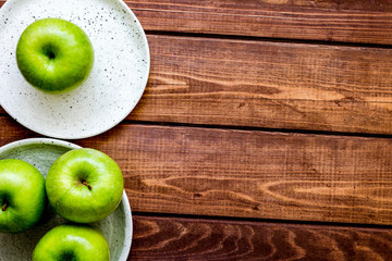 fresh organic green fruits with apples on wooden background top view mock-up