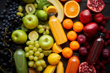 Healthy food concept. Various mixed fruits, vegetables and juices formed in rainbow