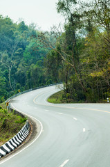 Fototapeta premium Curve of Asphalt Road on Mountain