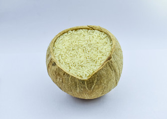 Rice for good health in a coconut bowl and also shows a very good background