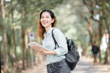 Happy young Asian University student.