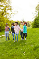 Obraz premium Group of kids is making a trip in the park