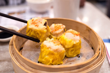 Steamed Siu Mai (Shumai) pork dumplings topped with crab roe, Hong kong　香港の飲茶...