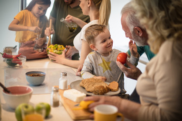 They enjoy cooking their meal.