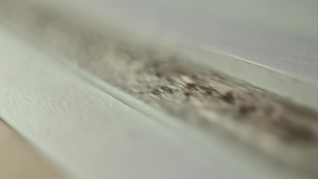 slider camera on the edge of the chipboard, close-up