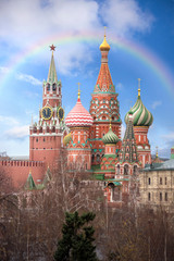 Fototapeta premium Saint Basil's Cathedral and Kremlin in Moscow, Russia known as The Cathedral of Vasily the Blessed, is a Russian Orthodox church on Red Square. Blue sky with a rainbow 