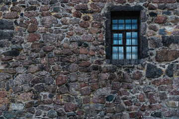 Fototapeta na wymiar window in the castle wall
