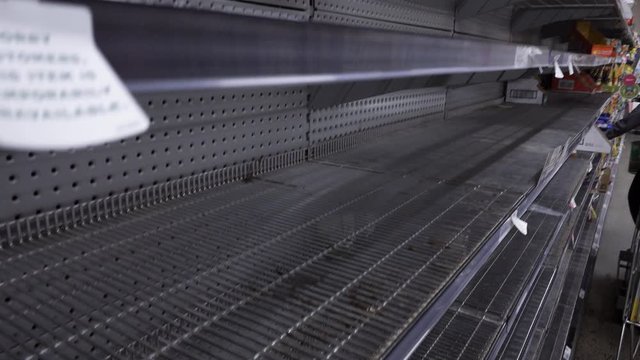 Empty shelves in the store. Food was sold out in the face of panic and crisis.