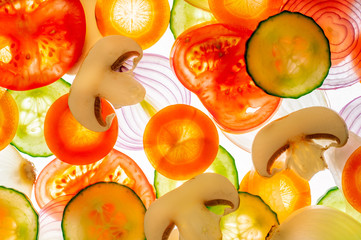 Mixed slices of fresh tomato, cucumber, onion, mushroom and carrot