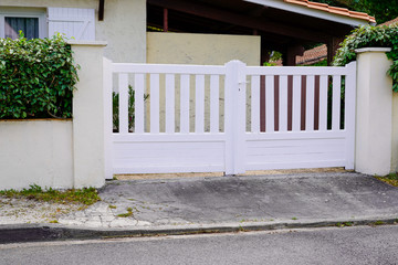 classic white aluminum home gate portal of suburbs house door in city