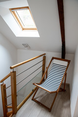 Decoration concept : Marine themed deckchair on the landing of a house