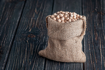 Sack of chickpeas stands on desk