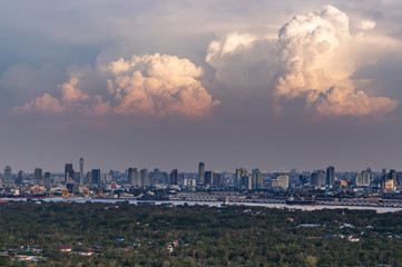 Fototapeta premium Beautiful view of Bangkok city, Beauty skyscrapers along Chaopraya river in the evening.