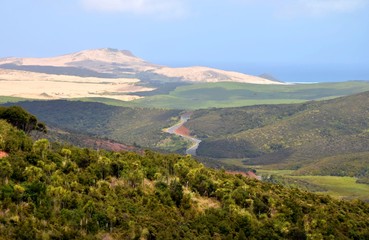 Aerial view from the mountains towards coastline near Cape Reinga New Zealand