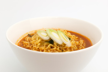 Ramen in bowl on white background