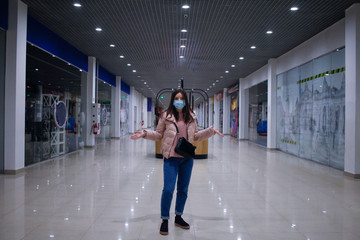 girl in epmty shopping center